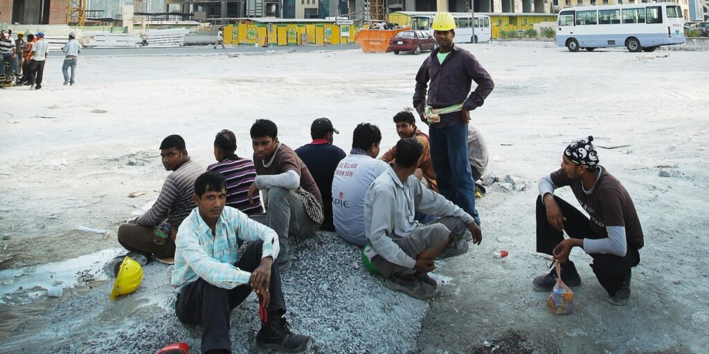 People sitting in the construction area.